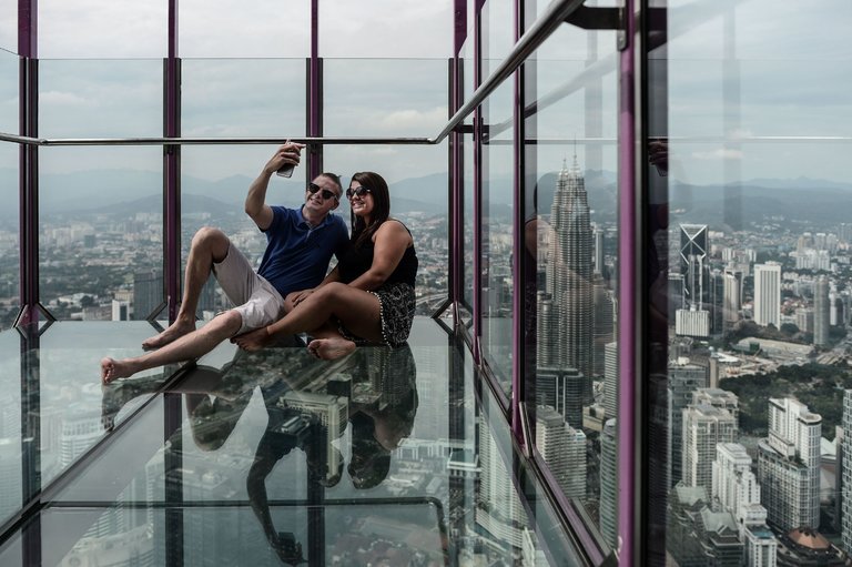 Mohammed Ehtsham, left, and Maham Ehtsham, both from England, in the Sky Box at KL Tower.